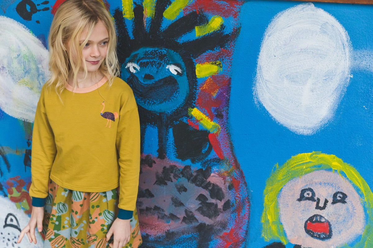 SALE: Langarm-Shirt uni Mustard mit Strauss von Baba