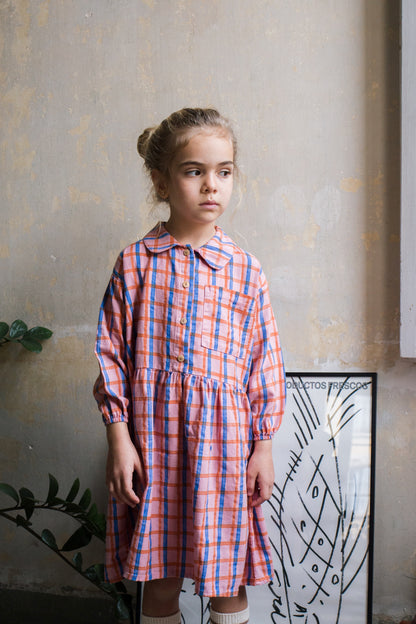 Blusenkleid mit Rastermuster auf Rosa von Lötiekids